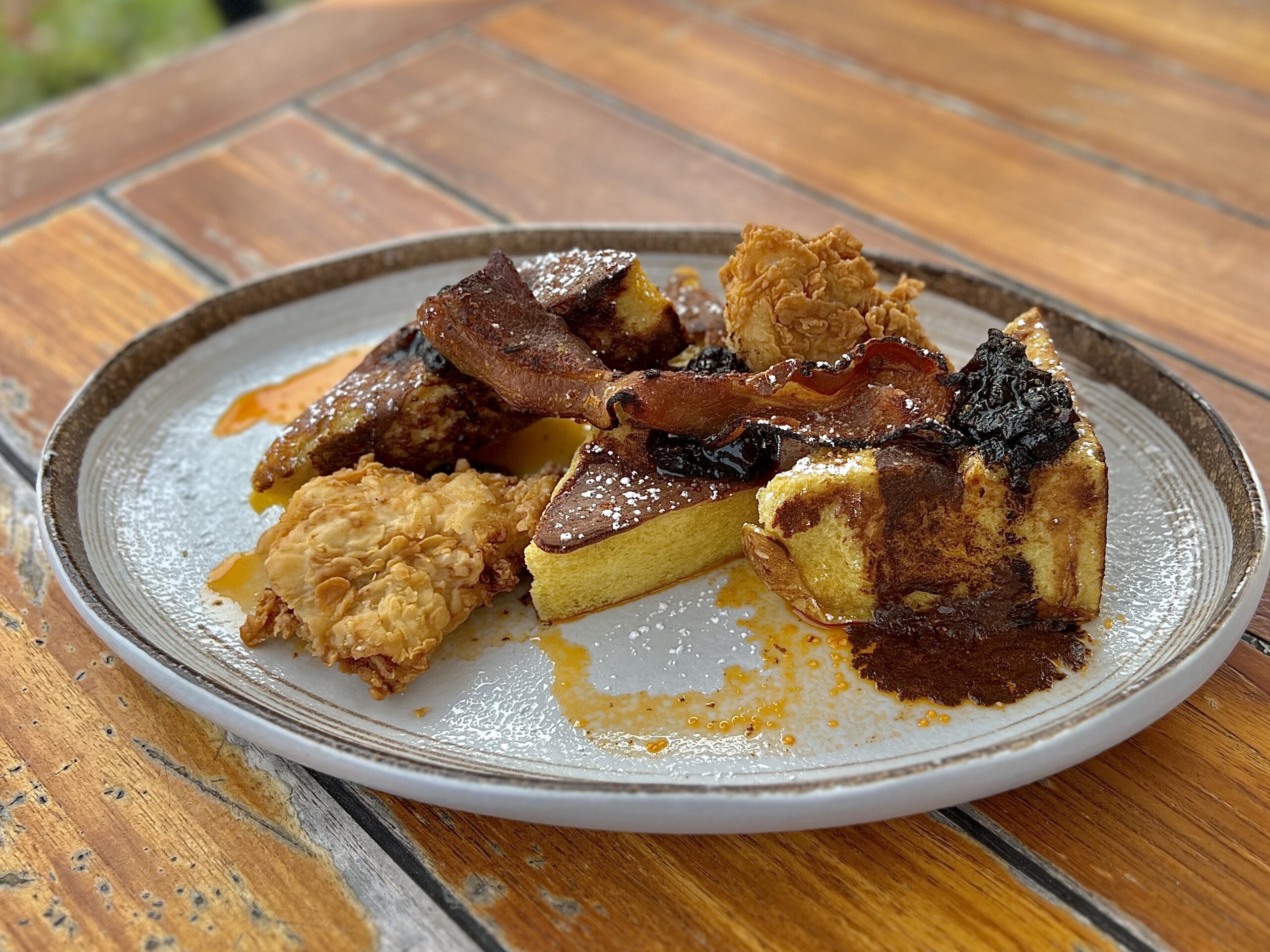 Delicious fried chicken dish with bacon and cornbread